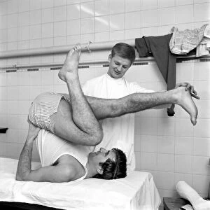 Injured player Johnny Quinn of Rotherham FC exercisingin the treatment room as he