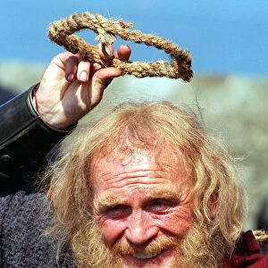 Ivanhoe Photo call at Blackness Castle James Cosmo who plays Cedric of Rotherwood holding