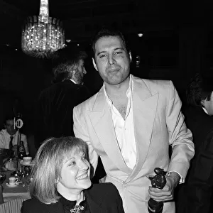 The Ivor Novello Awards. Pictured, Freddie Mercury of Queen and Mary Austin