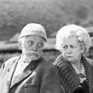 Jean Alexander Actress sitting with Bill Owen in a scene in "