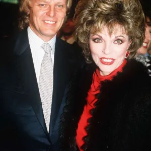 Joan Collins actress with husband Peter Holm switches the Regent Street Christmas lights