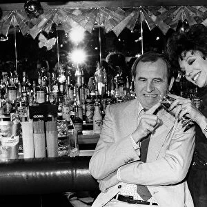 Joan Collins actress with Leonard Rossiter in Cinzano advert