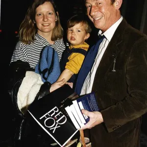 John Hurt Actor with wife Jo Dalton and son leaving the Ivy restaurant after the launch