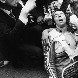 John Williams exhausted after pushing his bike for the last mile in the 1976 TT 500cc