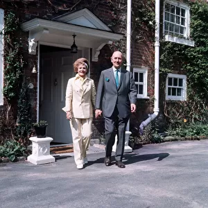 Johnn and Fanny Cradock outside their new home near Watford