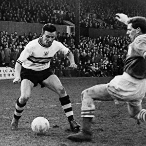Johnney Byrne of Crystal Palace moves on the ball. Circa 1958