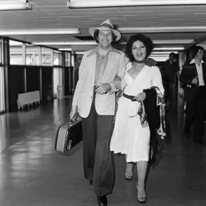 Johnny Dankworth and Cleo Laine at Heathrow Airport. 14th August 1975