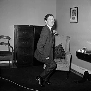 Kenneth Williams pictured in his agents office in Cork Street, London