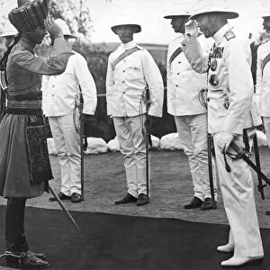 King George V returning the salute of an Indian Officer at Aden
