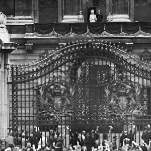 King George VI, Queen Elizabeth, flanked by Princess Elizabeth (far left