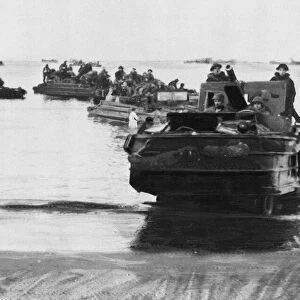 Landing craft carrying British troops near Nettuno. Picture
