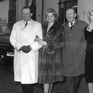 Leslie Phillips with Albert Lieven, Mary Peach and Liz Fraser at London Airport on way to