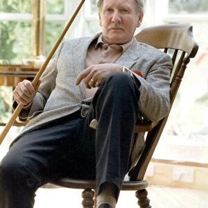 Leslie Phillips relaxing at home during interview - May 1990