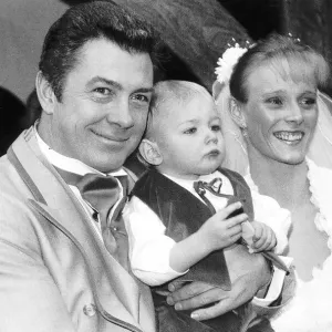 Lewis Collins Actor with wife Michelle Larrett and their 19-month old son Oliver at their