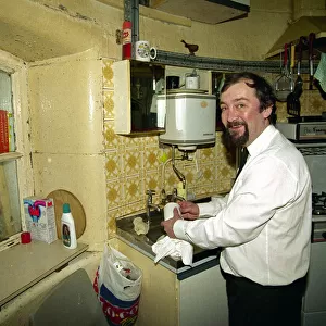 Lighthouse keeper Colin Jones seen here washing up during this last relief tour to