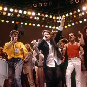 Live Aid concert at Wembley Stadium. All the stars on the stage at the end for
