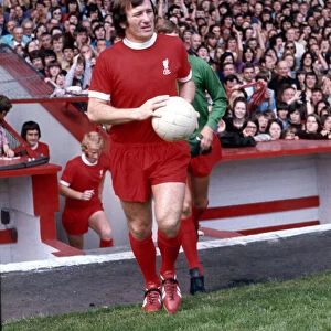 Liverpool footballer Tommy Smith waks on to the pitch before a league division one match