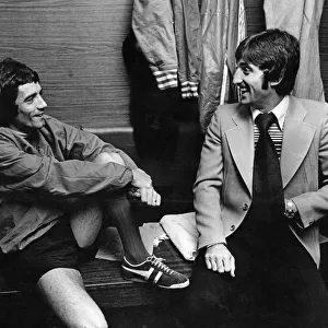 Liverpool footballers Kevin Keegan (left) and David Johnson share a joke in the dressing