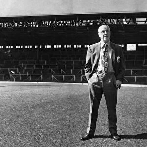 Liverpool manager Bil Shankly stands in front of an empty stand at Anfield
