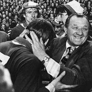Liverpool manager Bob Paisley celebrates with Kenny Dalglish after clinching the title