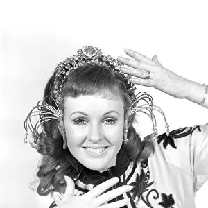 Maggie Vickers wearing one of the costumes she will appear in on television