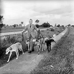 Man and Greyhounds: Frank Sanderson seen here at his St