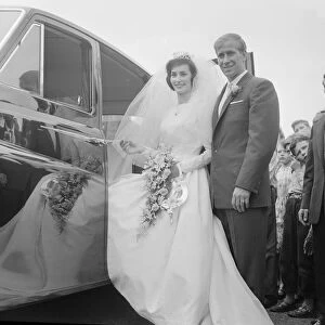 Manchester United and England footballer Bobby Charlton with his bride