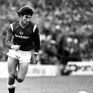 Manchester United footballer Norman Whiteside on the ball during the league match against