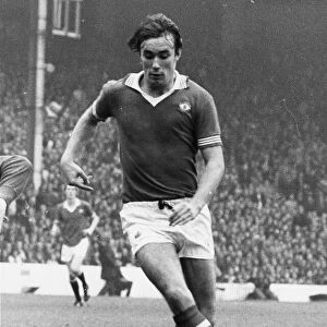 Manchester United footballer Sammy McIlroy on the ball during the League Division One
