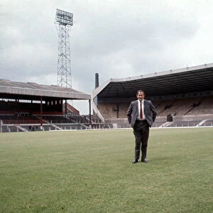 Manchester United manager Wilf McGuiness on the pitch at Old Trafford July 1970