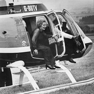 Margaret Thatcher hops out of the helicopter at Blagdon Hall