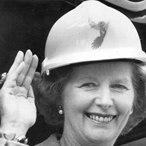 Margaret Thatcher wearing a hard hat during visit to construction site - July 1986