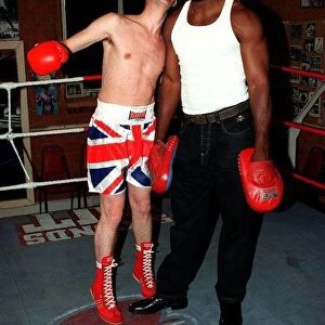 Matthew Wright with lennox lewis at london gym july 1997