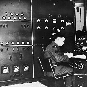 Mechanic at the control desk of a transmitting station. 18th June 1941