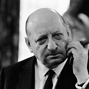 Media Mogul Lord Lew Grade speaking to a guest at a dinner party. 24th January 1967