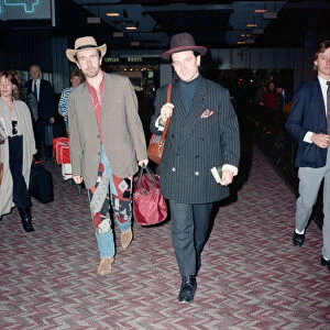 Members of U2, The Edge and Bono, leaving Heathrow for New York on Concorde for