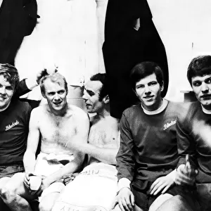 Members of the victorious Cardiff City team pictured in the dressing room after their 1-0