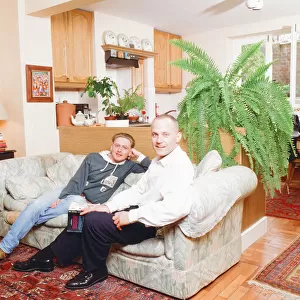 Michael Cashman, actor and partner Paul Cottingham, pictured at home together in Bow