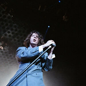 Michael Hutchence lead singer of INXS, pictured in concert - X Factor World Tour - at