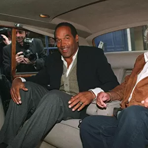 Michael Winner Actor and OJ Simpson in the back of a car