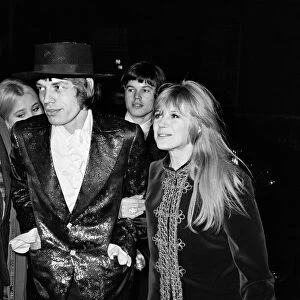 Mick Jagger of The Rolling Stones and Marianne Faithful arriving at The Royal Opera House
