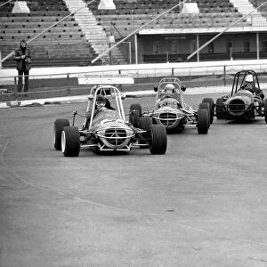Mini Grand Prix: White City Stadium: Graham Hill. March 1975