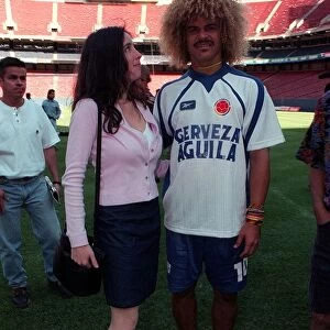Mirror girl Charlotte Kemp with Colombia Football 1998 team player Carlos