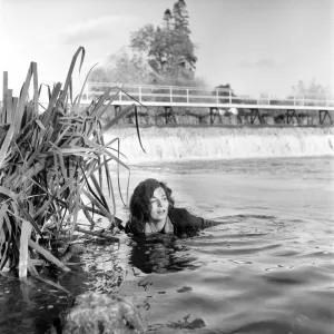 Black and white print of Cyd Hayman in the river during filming Black and white print of Cyd Hayman in the river during filming