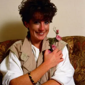Amanda Kirby Holding a Flower Print, November 1984 Amanda Kirby Holding a Flower Print, November 1984