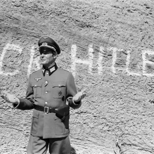 Roger Moore on the set of Escape to Athena in Rhodes, Greece. 8th March 1978 Roger Moore on the set of Escape to Athena in Rhodes, Greece. 8th March 1978