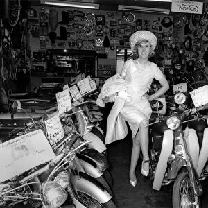Model Rene at her shop. Motor-cycling is in her blood. June 1966 P004907