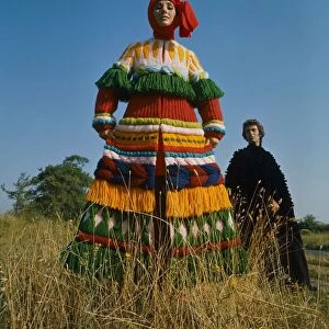Model wearing a knitted wool Russian styled peasant costume designed by Carosa