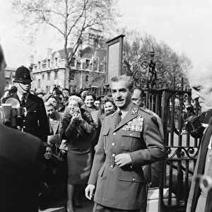 Mohammad-Reza Shah Pahlavi, the Shah of Iran, pays a visit to Westminster Abbey to lay a