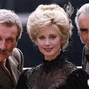 Morgan Fairchild centre with Christopher Lee right who plays the part of Sherlock Holmes